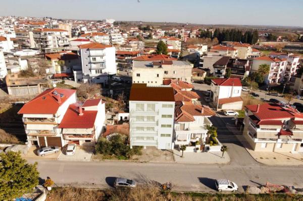 Image for Construction of a new four-story building on pilotis.